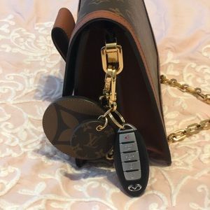Louis Vuitton key holder and bag charm